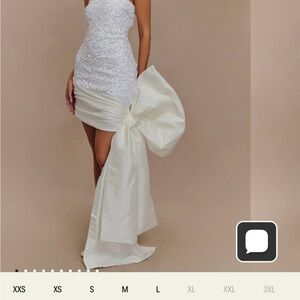 Elegant White Strapless Dress with Large Bow